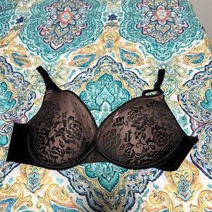 Color black and tan, size 38B, brand secret treasure, flases show in pictures